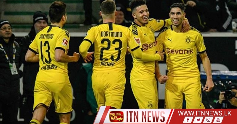 Dortmund move into second spot with 2-1 win at Gladbach